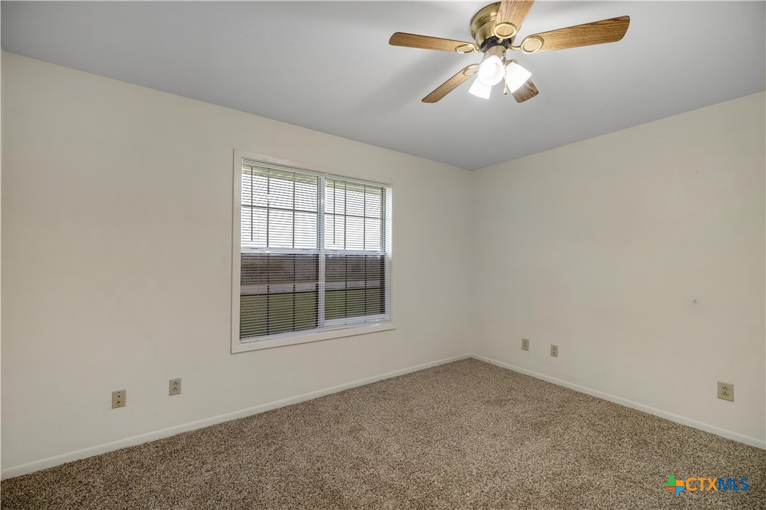 374-376 Navidad Street Vanderbilt, TX 77991 - Photo 17 of 28 an empty room with a window