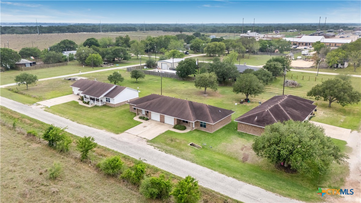 374-376 Navidad Street Vanderbilt, TX 77991 - Photo 24 of 28 an aerial view of a house with a garden