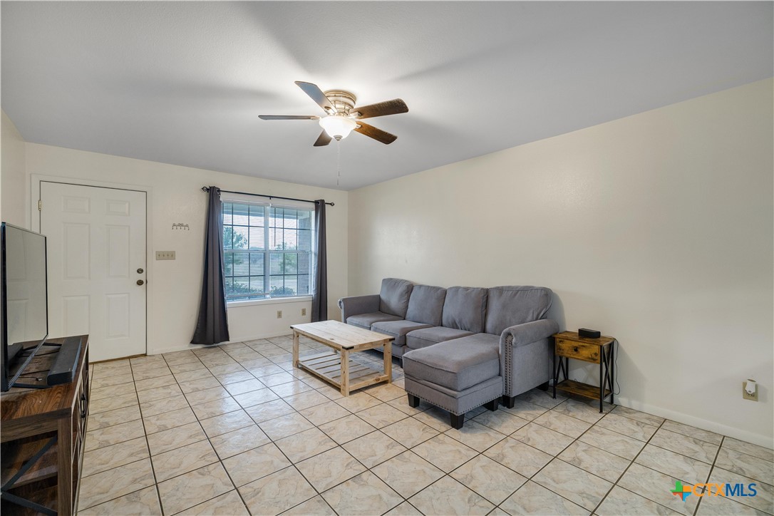 374-376 Navidad Street Vanderbilt, TX 77991 - Photo 5 of 28 a living room with furniture and a flat screen tv