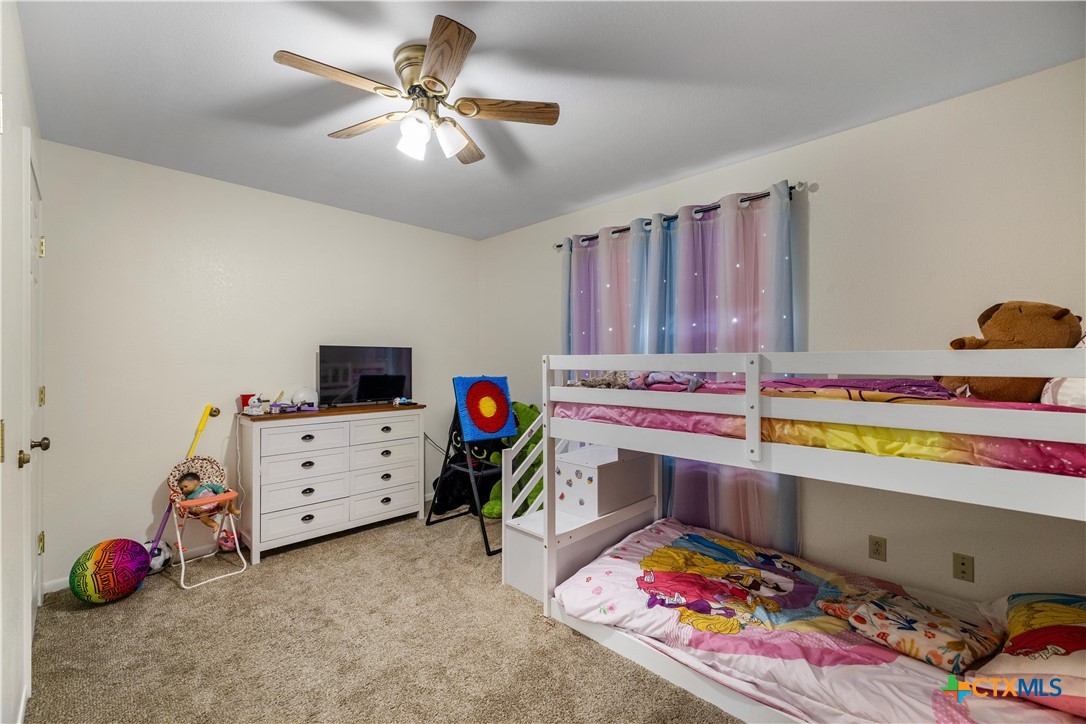 374-376 Navidad Street Vanderbilt, TX 77991 - Photo 10 of 28 a room with furniture and a flat screen tv