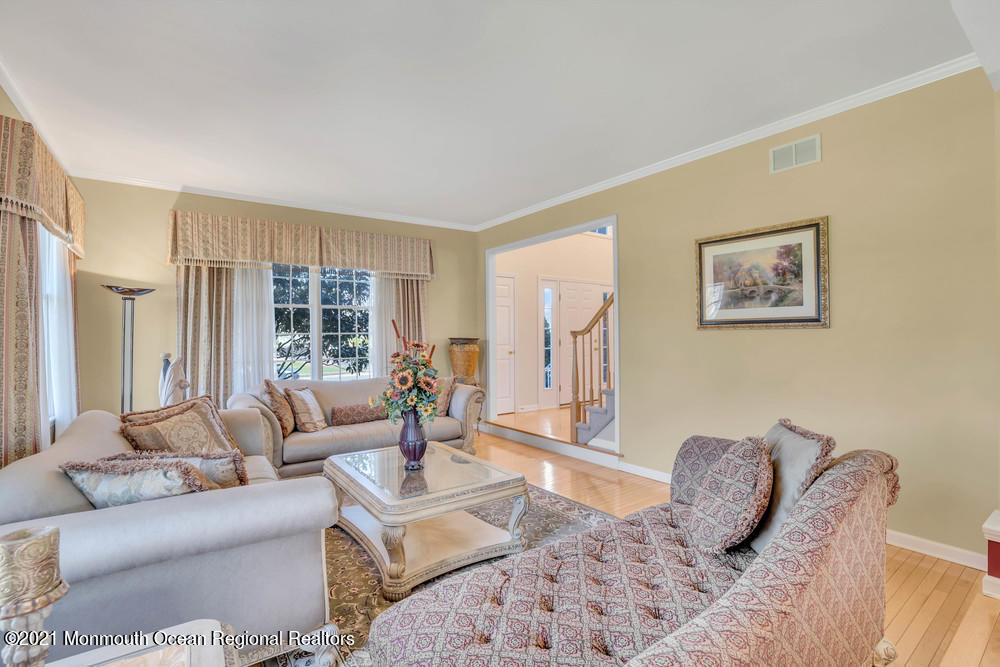 30 Red Oak Lane Freehold, NJ 07728 - Photo 19 of 73 a living room with furniture or couch and a window