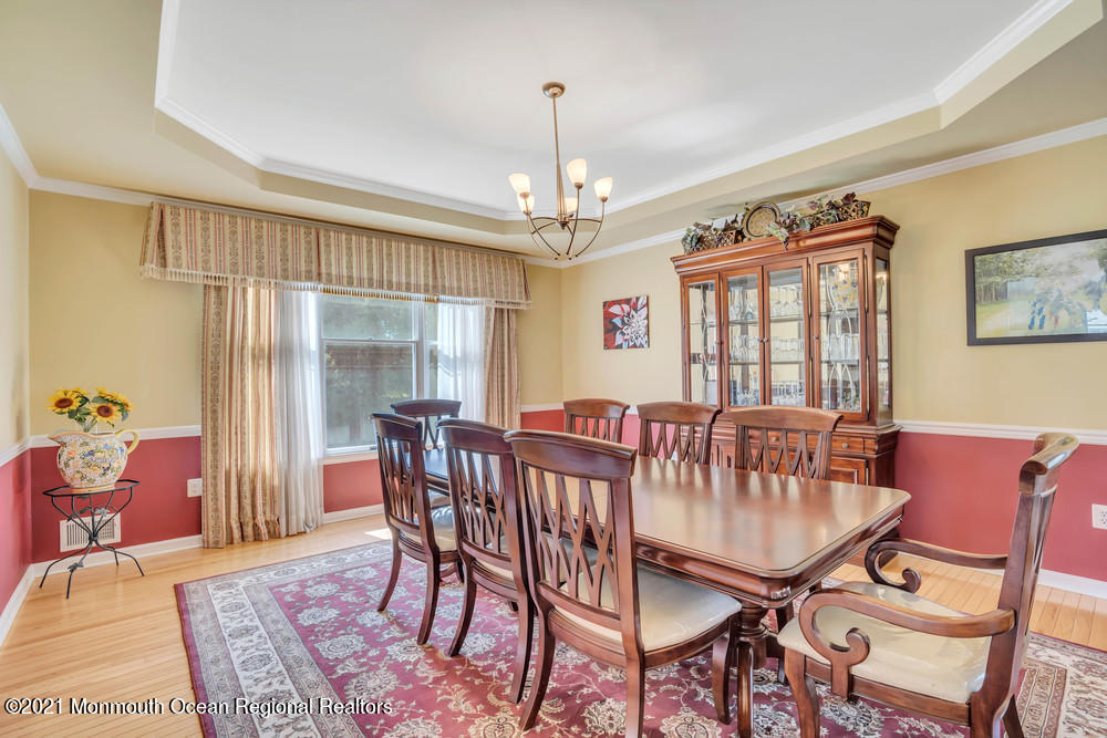 30 Red Oak Lane Freehold, NJ 07728 - Photo 21 of 73 a view of a dining room with furniture window and outside view