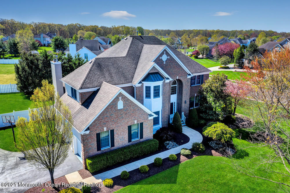 30 Red Oak Lane Freehold, NJ 07728 - Photo 4 of 73 an aerial view of a house