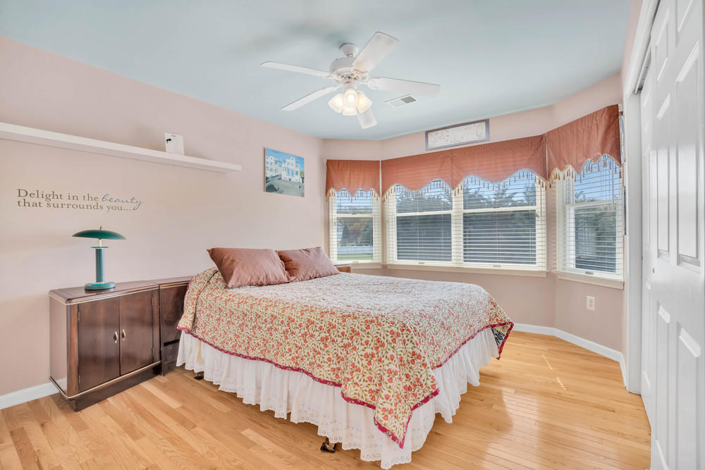 30 Red Oak Lane Freehold, NJ 07728 - Photo 43 of 73 a bedroom with a large bed and a window