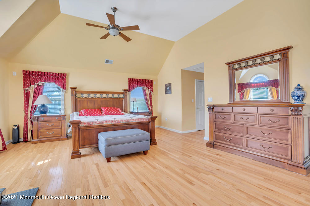 30 Red Oak Lane Freehold, NJ 07728 - Photo 47 of 73 a bedroom with furniture and a dresser
