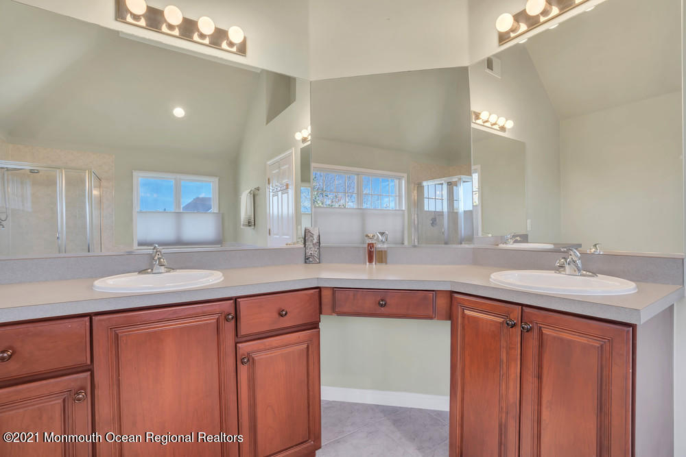 30 Red Oak Lane Freehold, NJ 07728 - Photo 51 of 73 a kitchen with a sink and cabinets