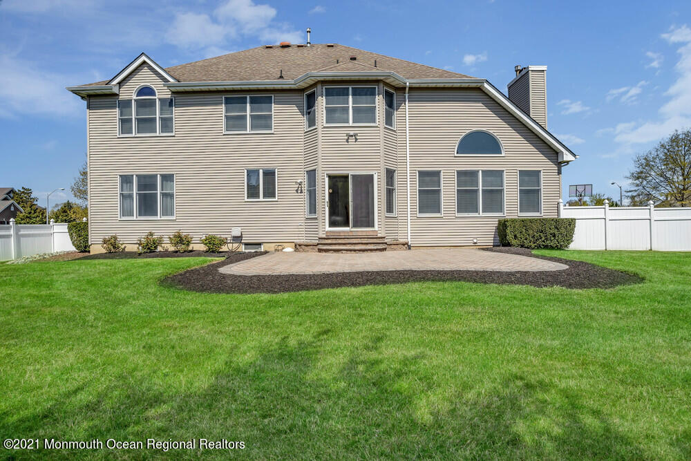 30 Red Oak Lane Freehold, NJ 07728 - Photo 56 of 73 a front view of a house with a yard