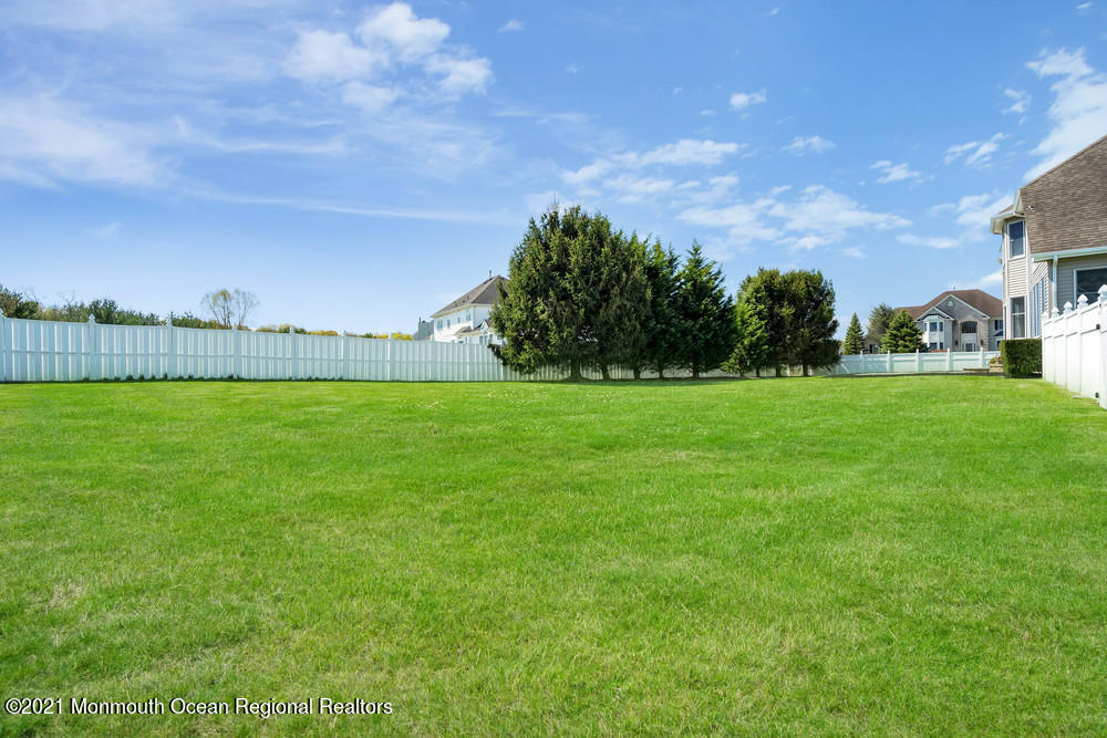 30 Red Oak Lane Freehold, NJ 07728 - Photo 58 of 73 a view of a garden and basketball court