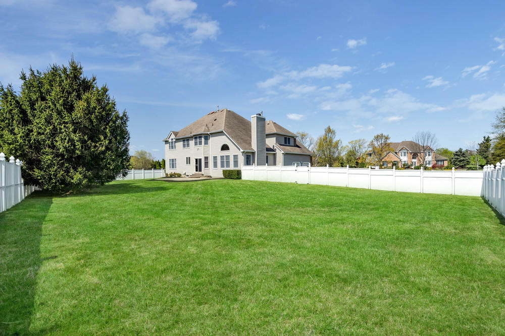 30 Red Oak Lane Freehold, NJ 07728 - Photo 63 of 73 a front view of a house with a yard