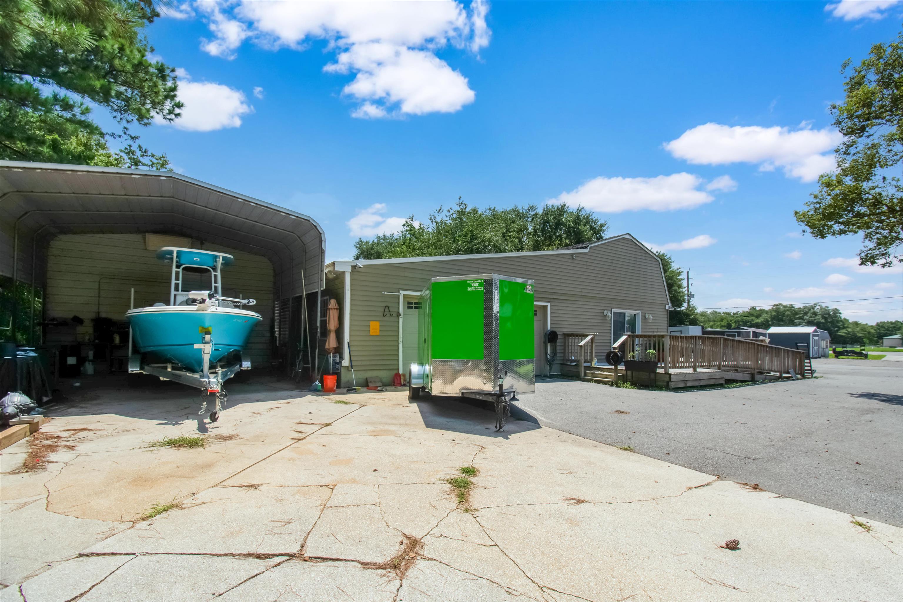 463493 State Road 200 Yulee, FL 32097 - Photo 12 of 20 a view of a backyard with sitting area and furniture