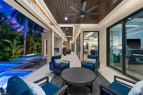 a lobby with furniture and window