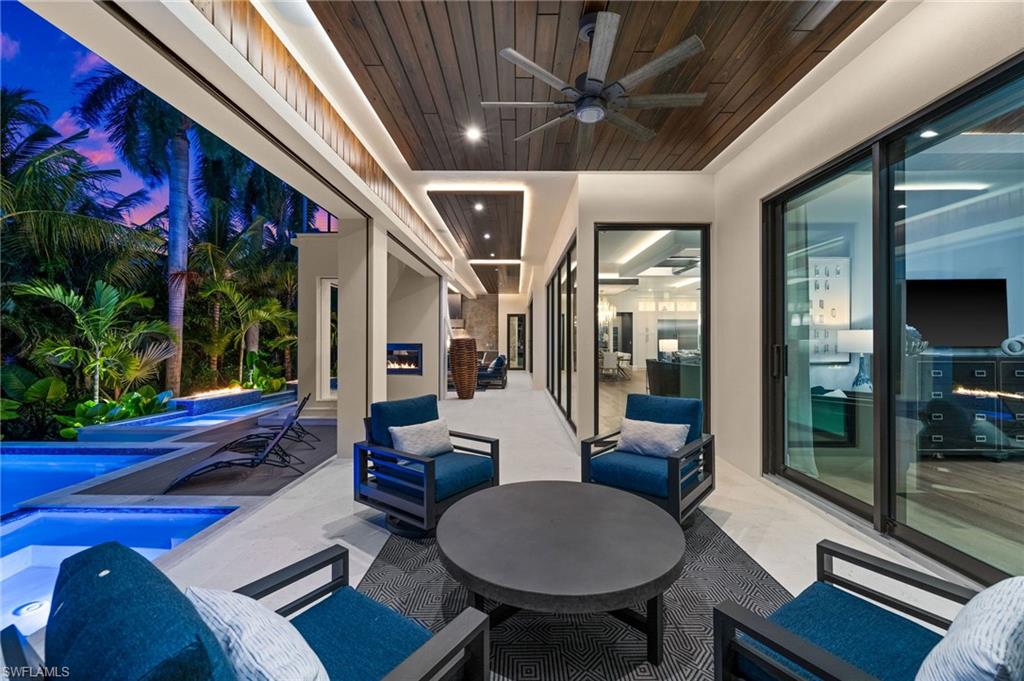 255 21st Avenue South Naples, FL 34102 - Photo 6 of 36 a lobby with furniture and window