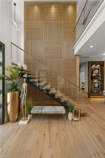 a view of a chairs and table on the wooden floor