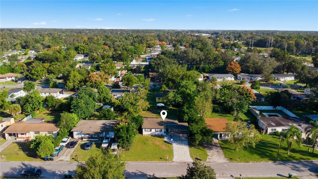 5601 Meridian Way Orlando, FL 32808 - Photo 33 of 34 an aerial view of multiple house