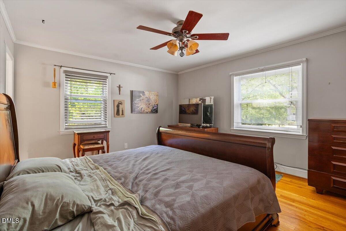 3107 Dixon Road Durham, NC 27707 - Photo 20 of 35 a bedroom with a large bed and a window