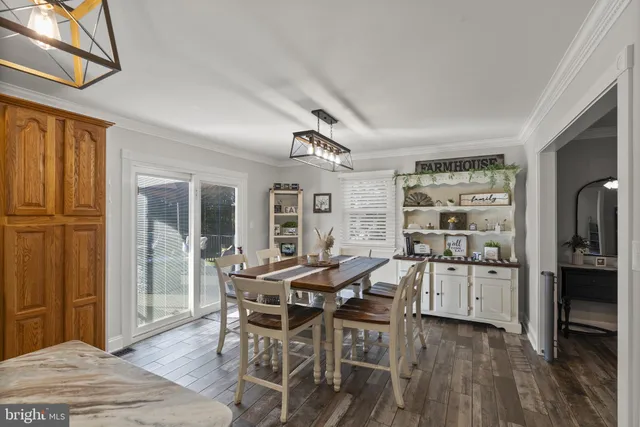 a bathroom with a sink toilet and mirror