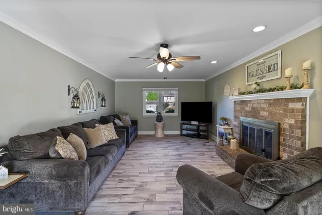 a view of a hallway with outdoor seating
