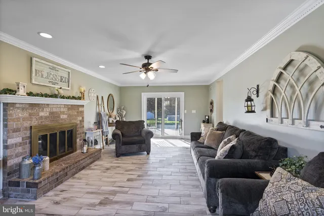 a bedroom with a bed a dresser and a window