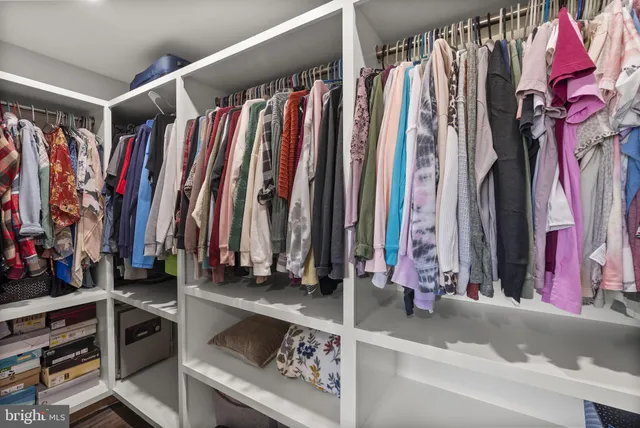 an aerial view of a house with a swimming pool