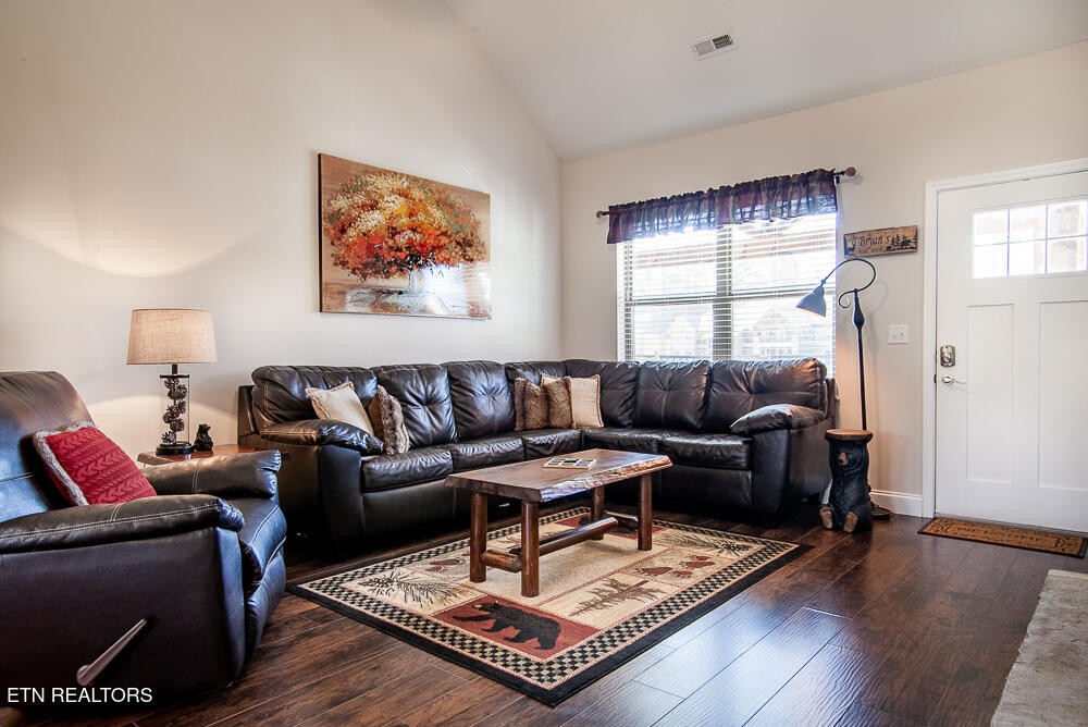 338 Shooting Star Loop, Unit 203 Townsend, TN 37882 - Photo 3 of 30 a living room with furniture a rug and a window