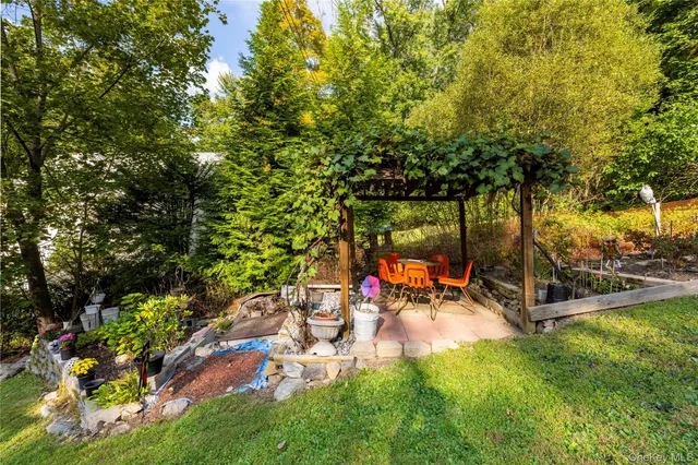 a view of a park with large trees