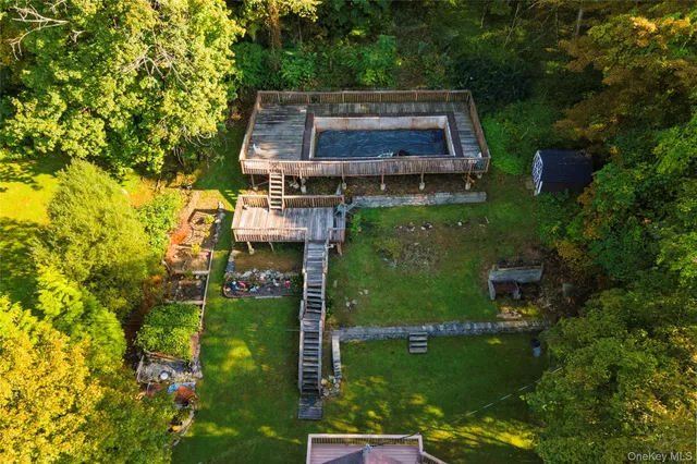 aerial view of a house with a garden