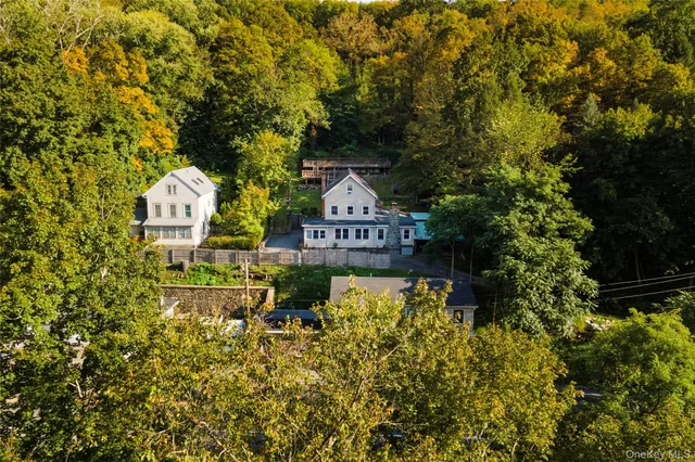 view of a house with a yard