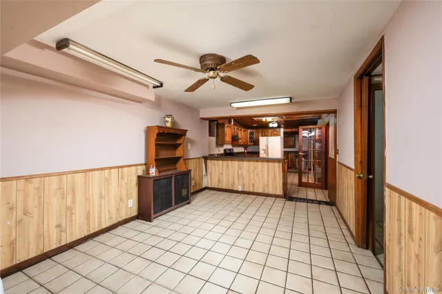 a view of a kitchen with a sink and cabinets