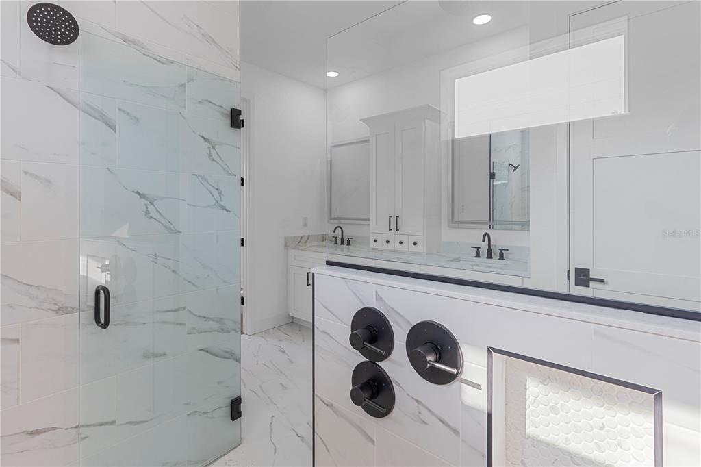 8090 Nordica Road Brooksville, FL 34613 - Photo 25 of 56 a bathroom with a sink a toilet and shower