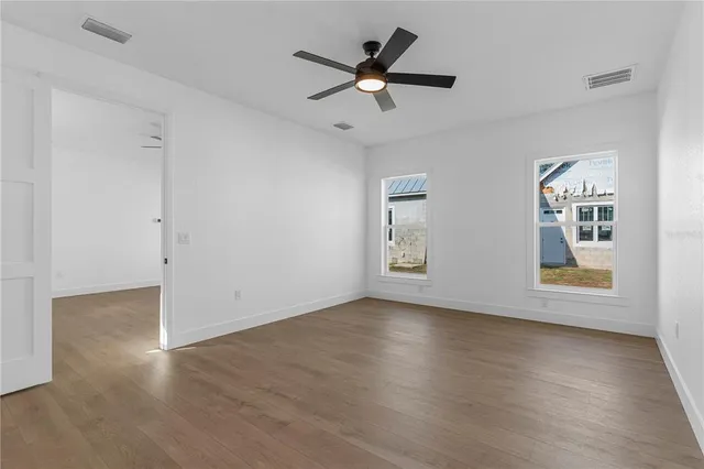 a view of an empty room with a window