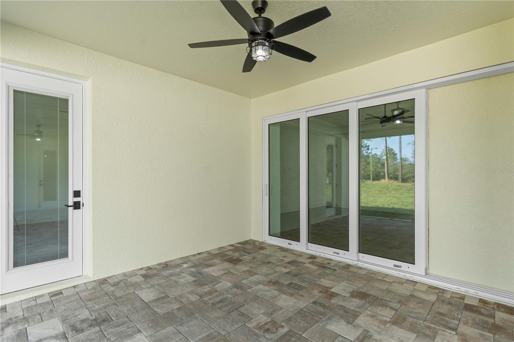 8090 Nordica Road Brooksville, FL 34613 - Photo 46 of 56 a view of an empty room with a window