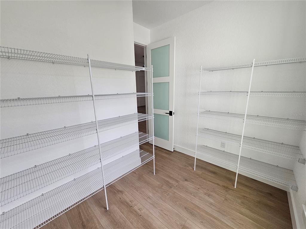 8090 Nordica Road Brooksville, FL 34613 - Photo 10 of 56 a view of an empty walk in closet