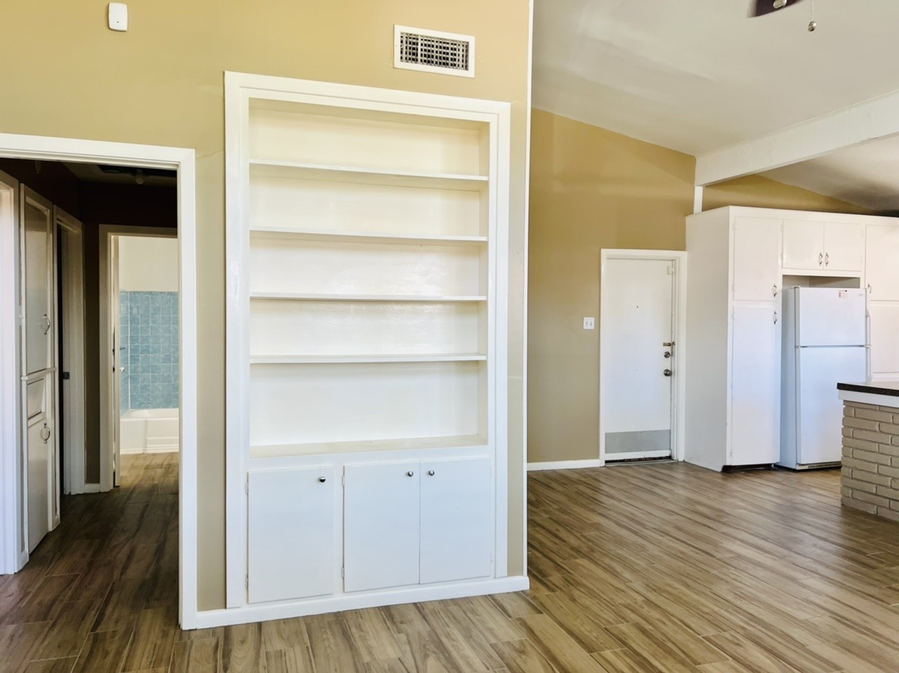 4731 Merwin Street Houston, TX 77027 - Photo 14 of 28 a view of empty room with wooden floor