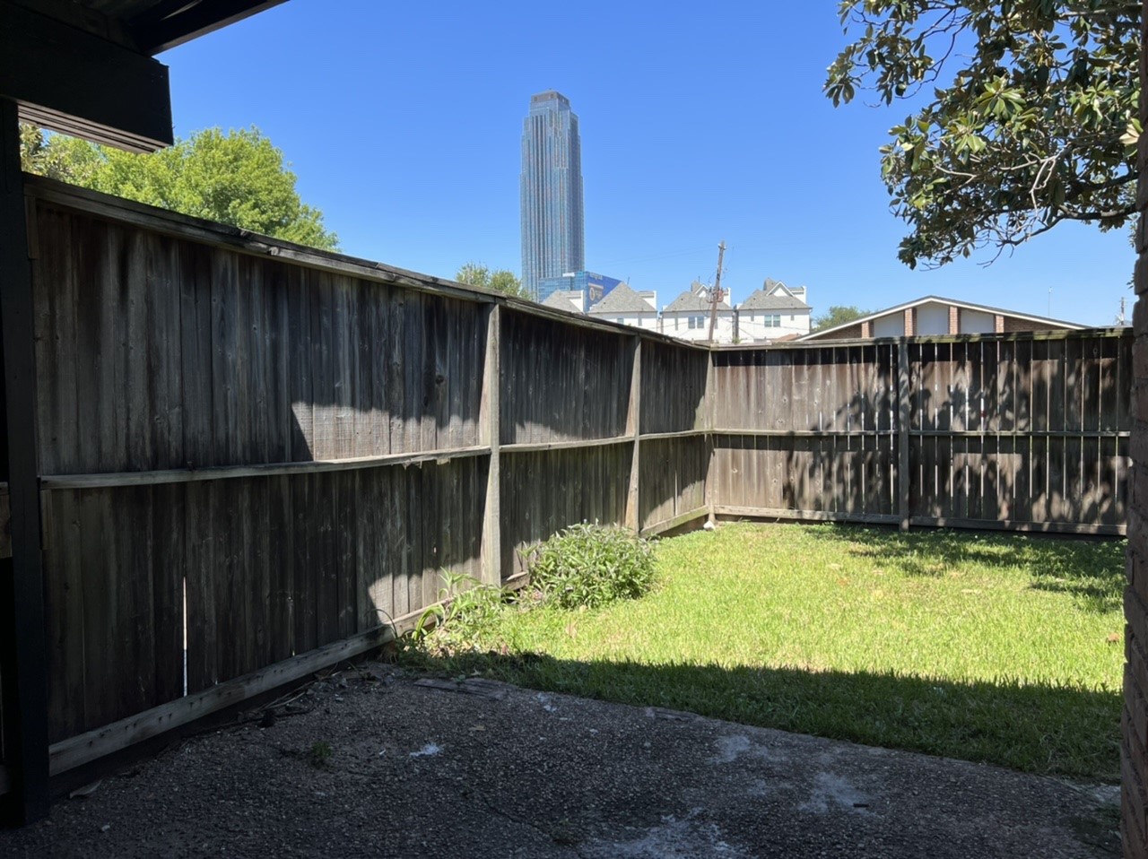 4731 Merwin Street Houston, TX 77027 - Photo 27 of 28 a view of a backyard with a small pool