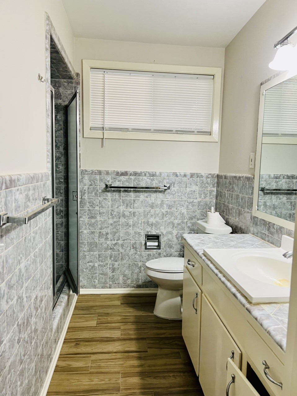 4731 Merwin Street Houston, TX 77027 - Photo 10 of 28 a bathroom with a sink and a toilet