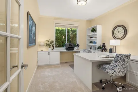 a dining room with furniture and window