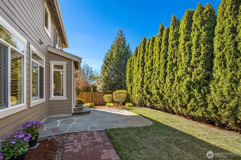 a backyard of a house with lots of green space