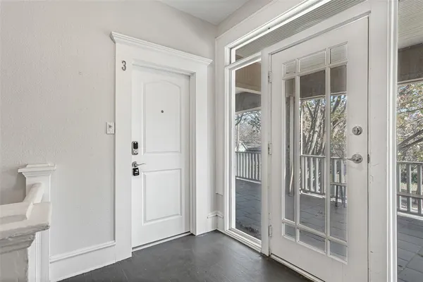 a view of a bathroom from a hallway