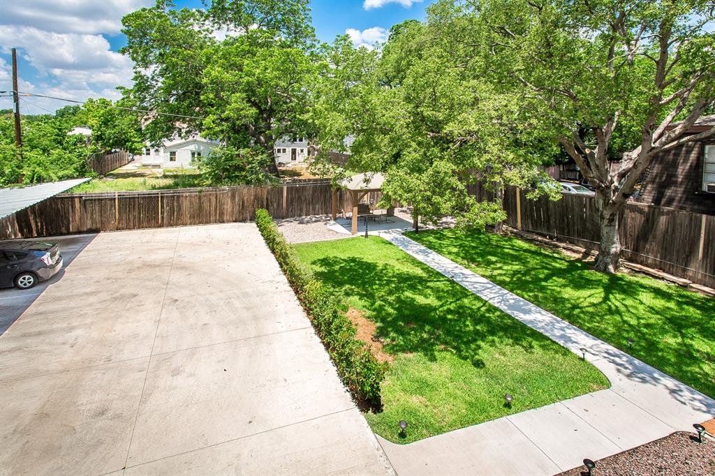 4719 Junius Street, Unit 3 Dallas, TX 75246 - Photo 29 of 36 a view of backyard with green space