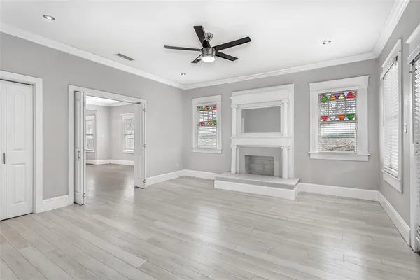 a view of livingroom with hardwood floor and a ceiling fan