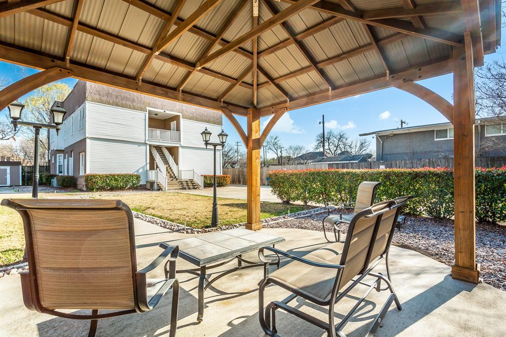 4719 Junius Street, Unit 3 Dallas, TX 75246 - Photo 31 of 38 a view of a swimming pool with a patio