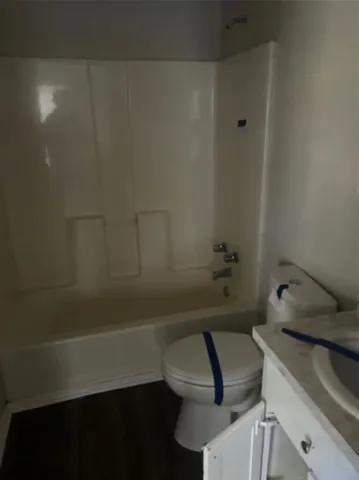 a bathroom with a sink and a bathtub