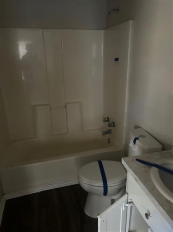 307 South Jernigan Street Bells, TX 75414 - Photo 9 of 10 a bathroom with a sink and a bathtub