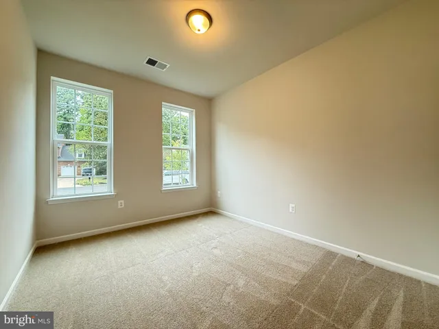 a view of swimming pool with an outdoor space and seating area