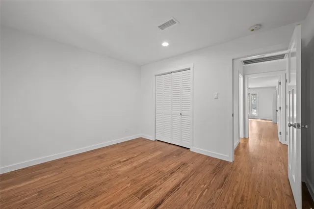 a view of a house with a yard and garage