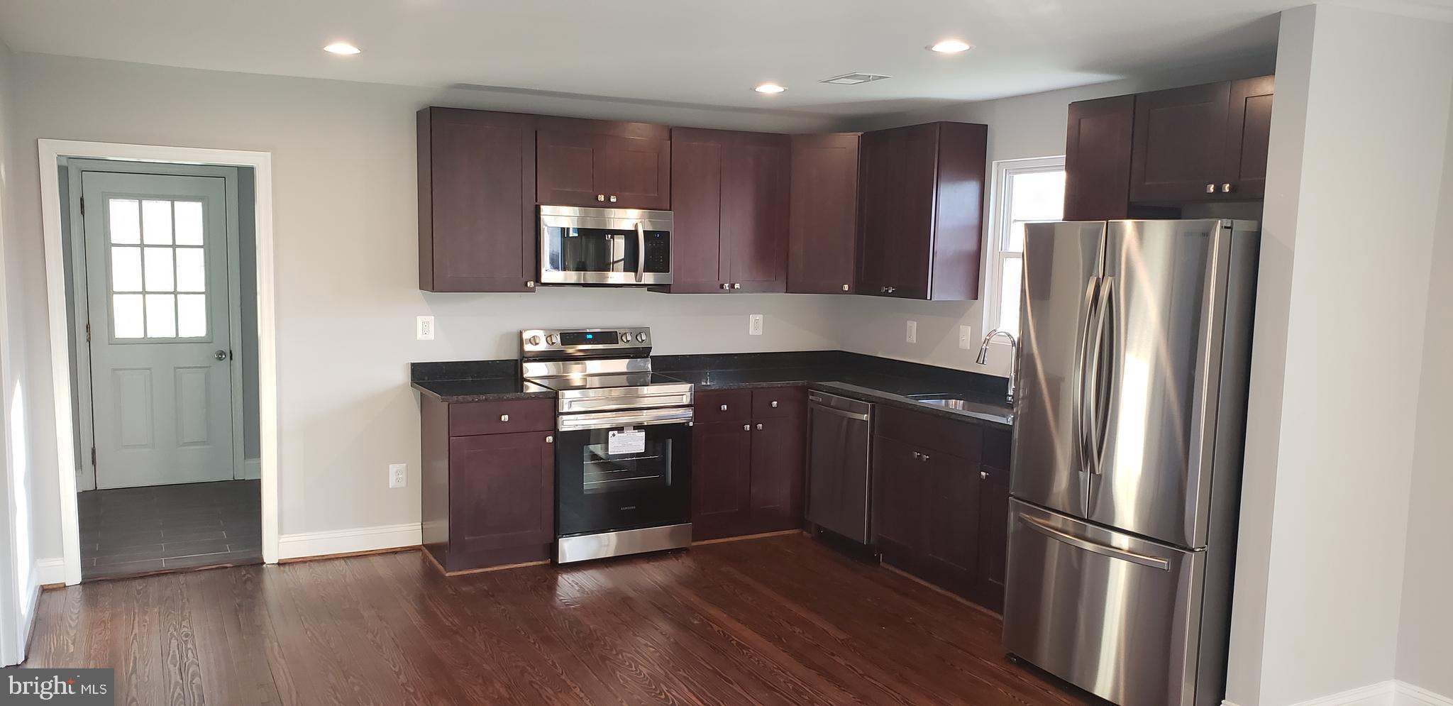 5346 Bucktown Road Cambridge, MD 21613 - Photo 3 of 11 New Kitchen to Mudroom/ Utility Room