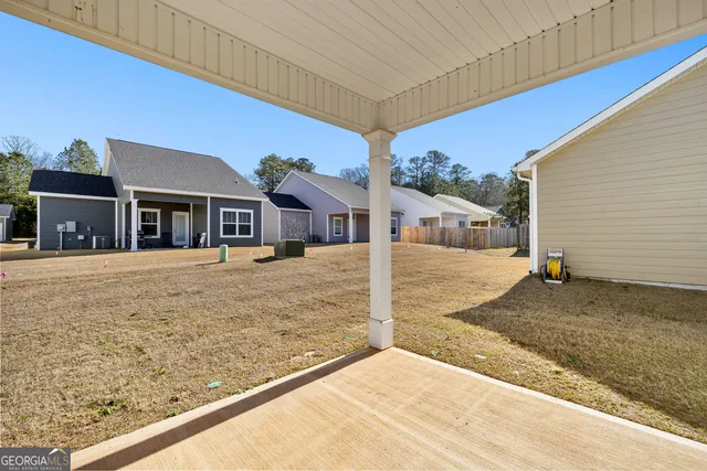 a view of residential houses with street