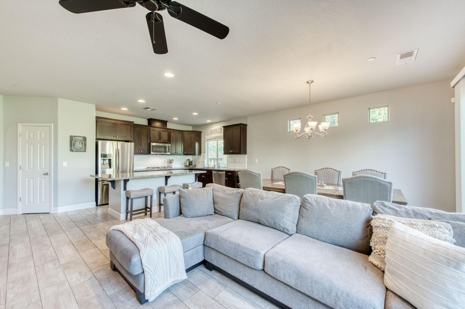 3539 Taylor Lane Clovis, CA 93619 - Photo 13 of 33 a living room with furniture and a view of kitchen
