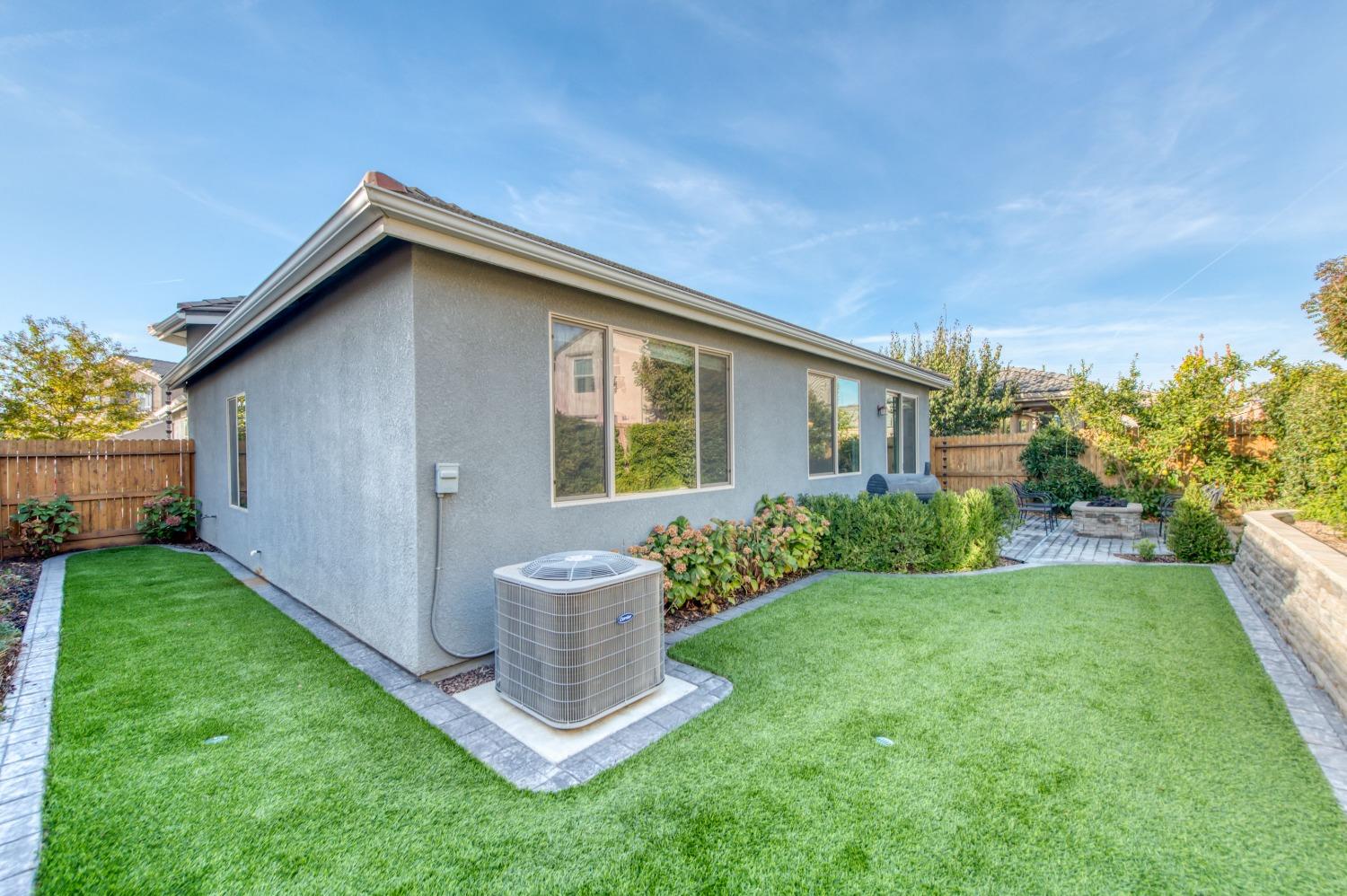 3539 Taylor Lane Clovis, CA 93619 - Photo 32 of 33 a front view of a house with garden