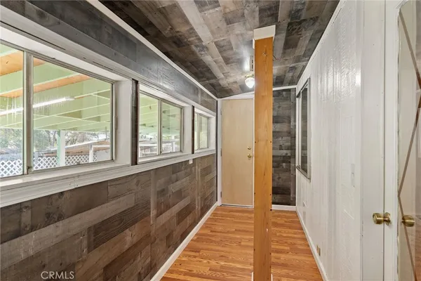 a view of a hallway with a window